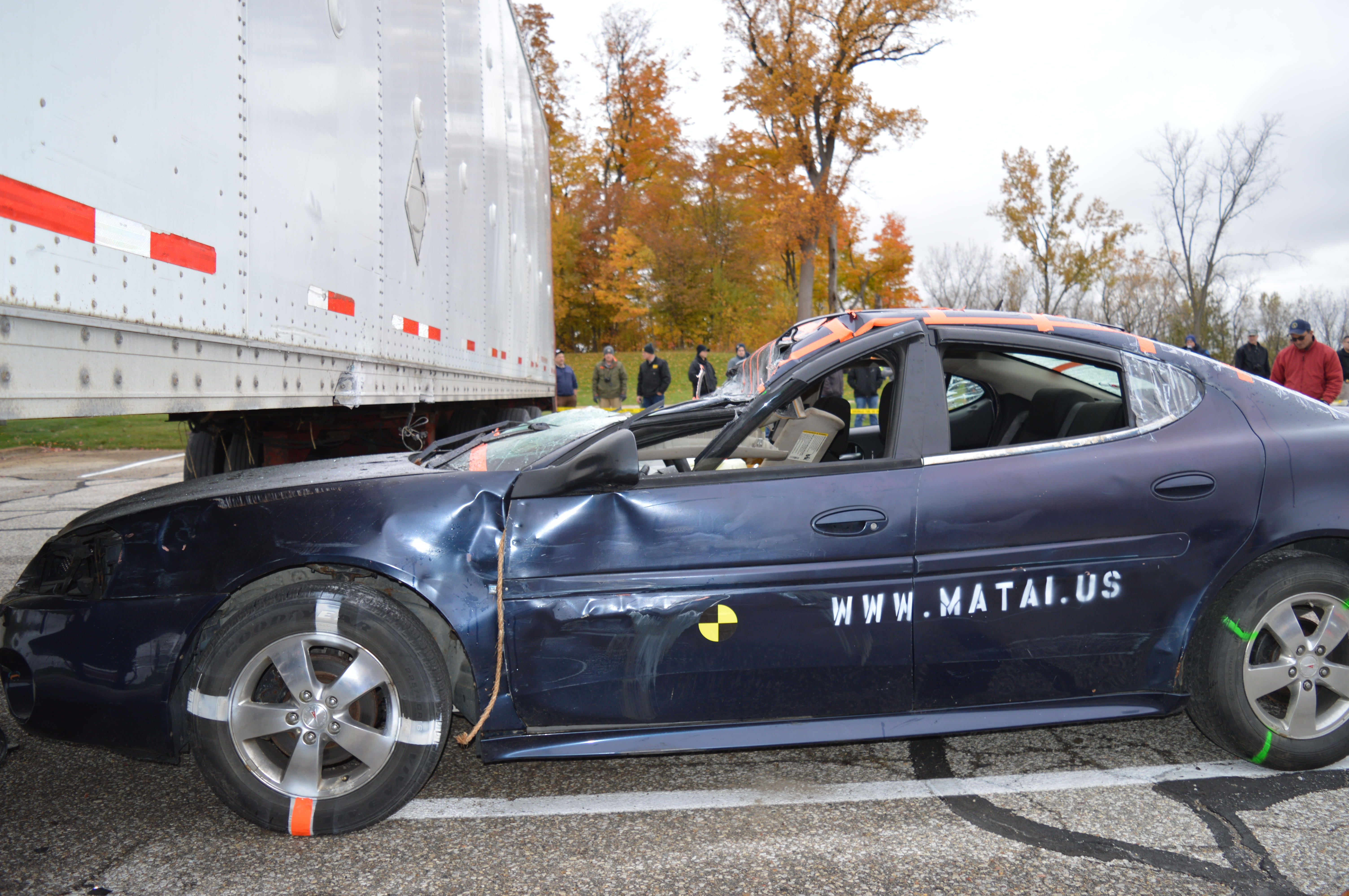Crash test analysis — car impacting tractor-trailer underride guard